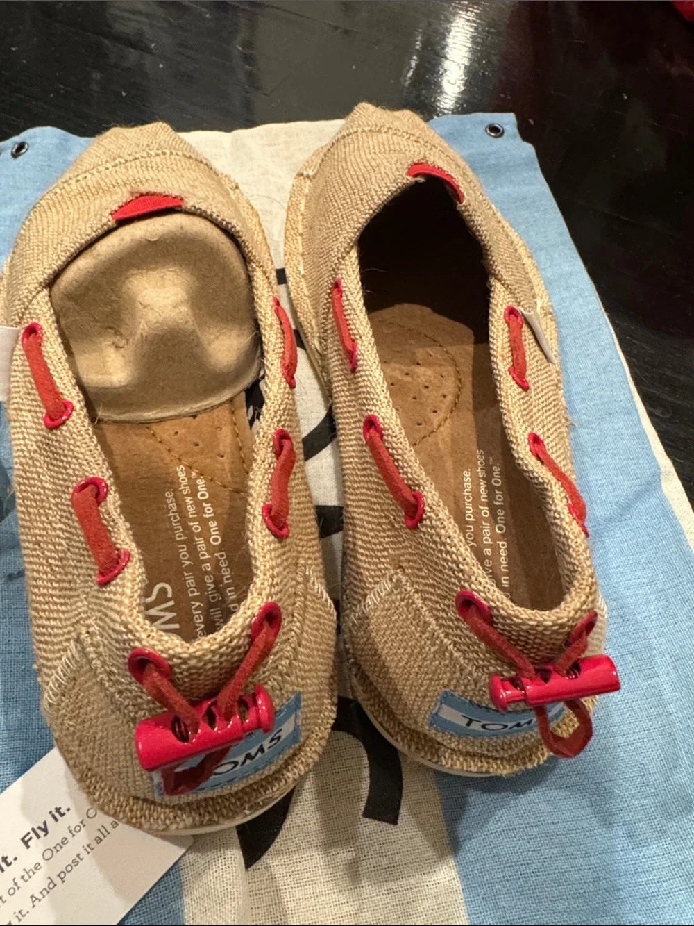 Toms Kids Slip-On Moccasins in Tan with Red Accents
